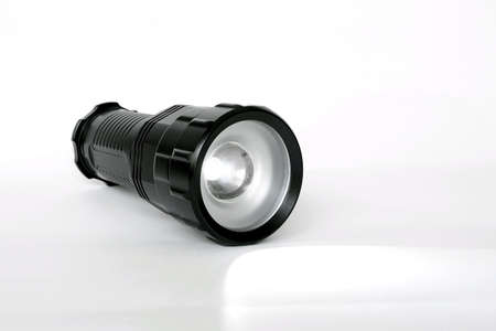 Flashlight isolated on white colored backgroundの素材