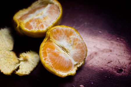 Some orange on wooden background. Vintage color.の写真素材