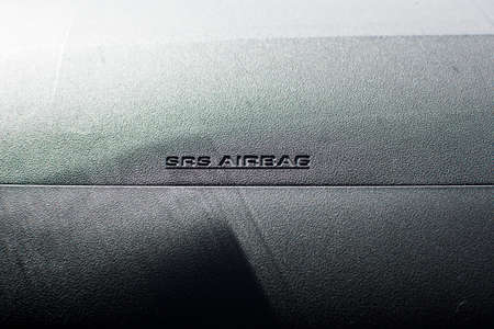 SRS Airbag icon in car. selective focus.