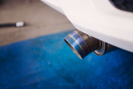 Close up of a car exhaust titanium pipe.の写真素材