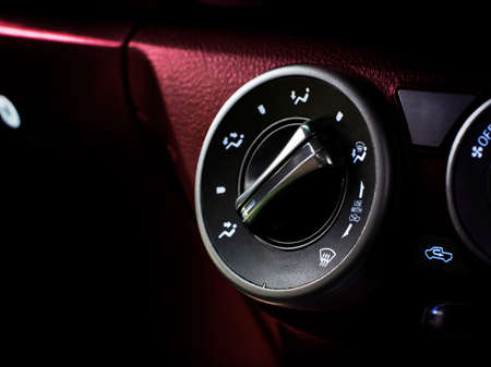 Air direction control switch for air conditioning in cars.