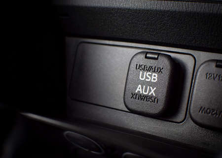 USB and aux ports for connecting multimedia players in luxury car.の写真素材