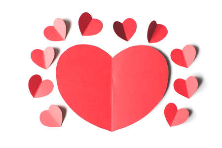 Valentines day card concept, Big red heart surrounded by small red hearts on a white...