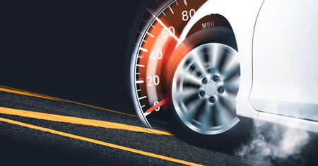 Race car start on track and burning tire,speedometer indicator sweeping to 60 mph,Double exposure concept and copy spaceの写真素材