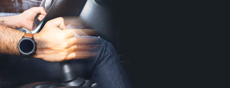 The driver controls the gear lever of manual transmission in the car and black background with copy spaceの写真素材