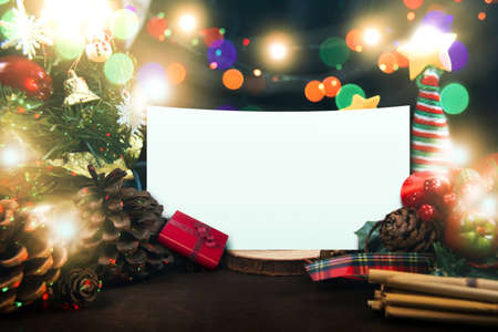 Merry Christmas and a Happy New Year concept, with a decorated ornament, a gift box, a Christmas...
