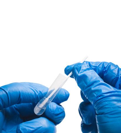 Medical personnel infusion a cotton swab to saline extraction tube for diagnostic , isolated on...