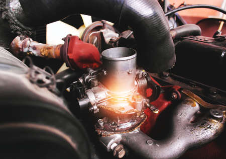 Throttle valve is hot in the engine compartment of the car.