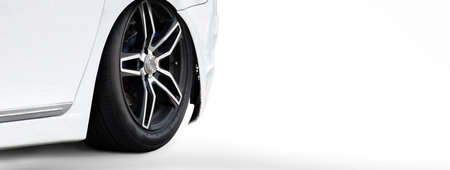 White sports car coupe parked on a white background, panoramic banner with copy space.の写真素材