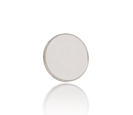 Silver coins isolated on white background with reflection, Business and finance concept, clipping pathの写真素材