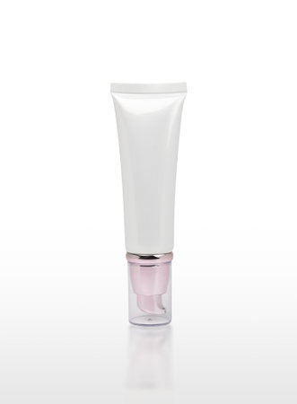 Cosmetic cream bottle isolated on white background with reflection, clipping path included.の写真素材