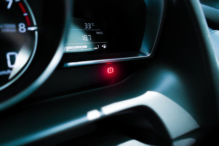 Brake warning light illuminated on instrument panel in a car , Automotive maintenance conceptの写真素材