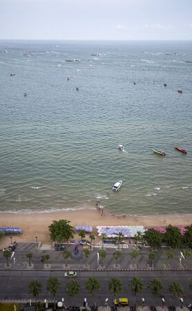 Top view of the Pattaya beach with people traveling to sea