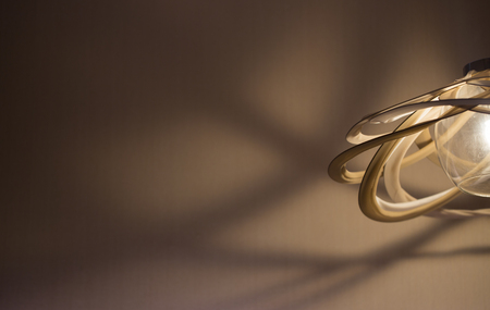 An illuminated hanging lamp on the wall
