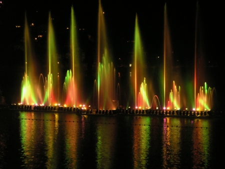 illuminated fountain at upper lake in Arosaの写真素材