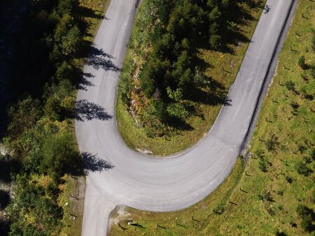 Look at a hairpin bend of a mountain roadの写真素材