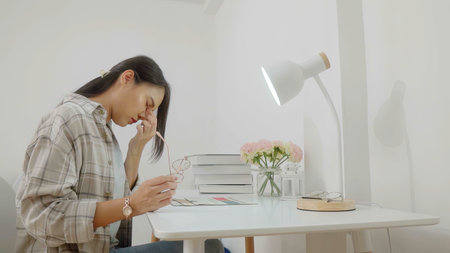 Asian woman with eyesight problems.の写真素材