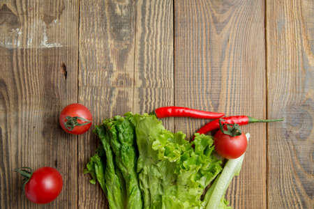 Vegetables on wooden tableの写真素材