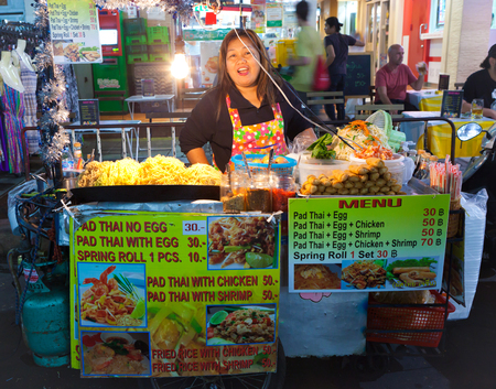 BANGKOK THAILAND- JAN 16  An unidentified Padthai seller standing on Khaosan Road Bangkok, Thailand on 16 January 2014  Padthai is one of the most famous food for foreigner in thailand のeditorial素材