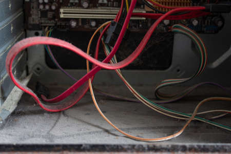 An old family computer filled with spider webs, dust and viruses. Maintenance is a key to keep computers healthy and working.の写真素材