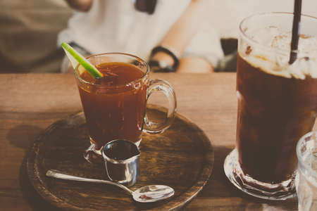 Concepts with tea and coffee table. A tray full of coffee and snacks served in a beautiful...