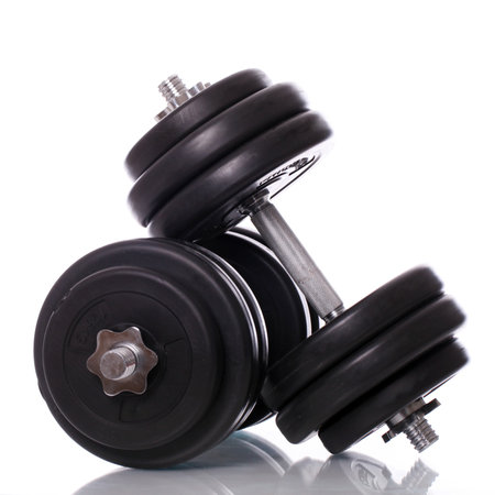 Big dumbells over white backgroundの写真素材