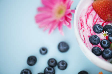 Close up of strawberry and blueberry served in a plate