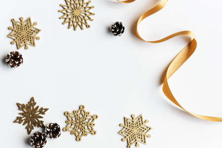 Flat lay of Christmas decor on white surfaceの写真素材