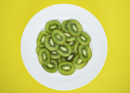 Flat lay of kiwi slicesの写真素材