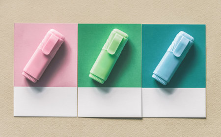 Flat lay of three highlighters on three spaced cardboard frames