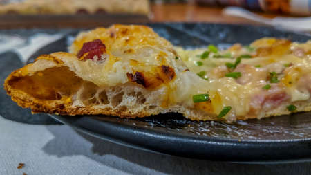 Delicious pizza close up on wooden board and concepts. Italian national food.