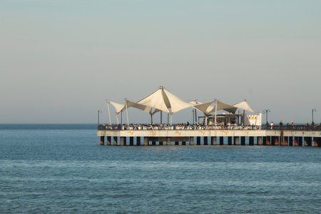 Samsun,Turkey - November 27, 2022 A long pier with a coffee shop on it. high quality photo