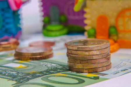 a tower of Euro coins, banknote, European currencyの写真素材