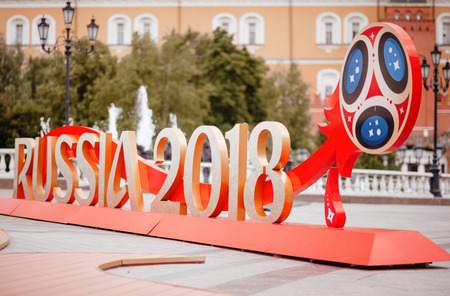 MOSCOW, RUSSIA - MAY 31, 2018: The inscription "Russia 2018" installed before start of FIFA World Cup at Manezh Square. Walking people, Kremlin and Manege Square on the background.のeditorial素材