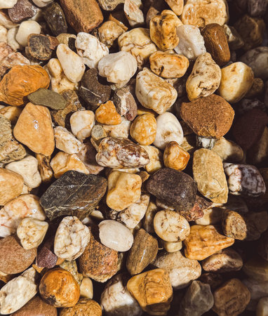 Marble chips, stone for landscape design, top view background