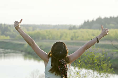 Free Happy Woman Enjoying Nature. Beauty Girl Outdoor. Freedom concept. Beauty Healthy Girl over Sky...