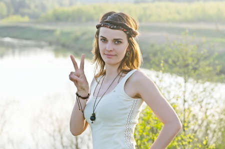 Free Happy Woman Enjoying Nature. Beauty Girl Outdoor. Freedom concept. Beauty Healthy Girl over Sky and Sun. Happinessの写真素材