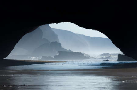 Red archs on atlantic ocean coast in Marocco, Legzira beach