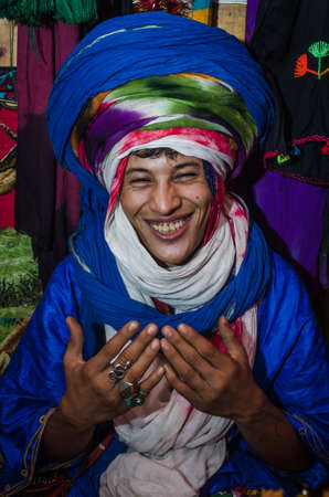 ESSAOUIRA, MOROCCO - September 18, 2015: Young unknown bedouin in his house and small shop. Somwhere...