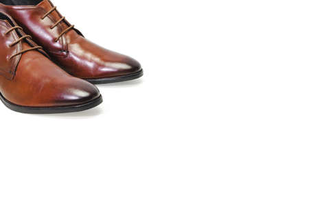 Borwn leather men shoes isolated on white background. Side viewの写真素材