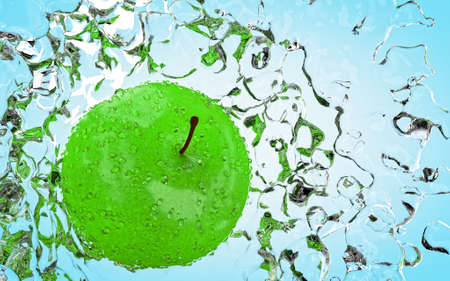 Apple with water splash on beautiful light blue background.の写真素材