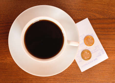 One cup of coffee on a wooden tableの写真素材