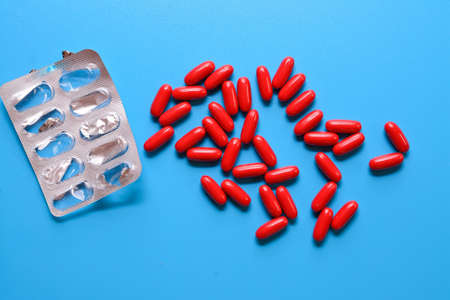 medical pills on a blue background