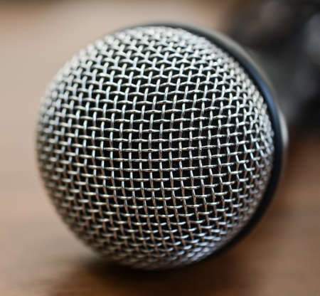 one microphone on wooden tableの写真素材