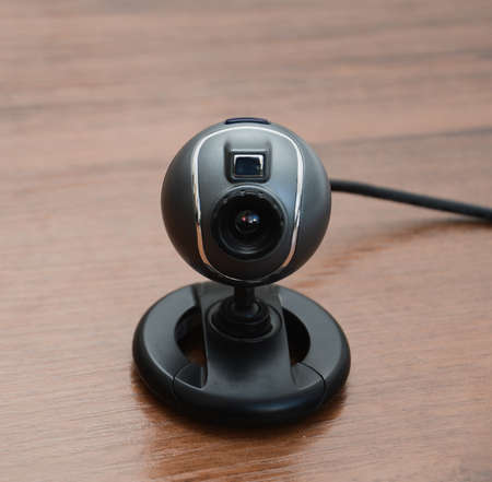 web camera on the wooden tableの写真素材