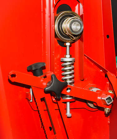 red detail of agricultural machines. Spring steel