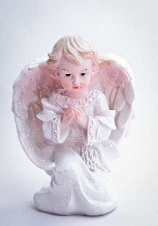 little Christmas angel on a white backgroundの写真素材