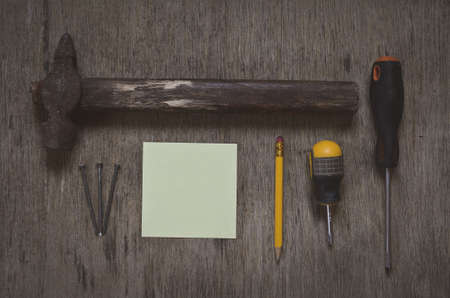 worker set: hammer, screwdriver, nails and clean form to orderの写真素材