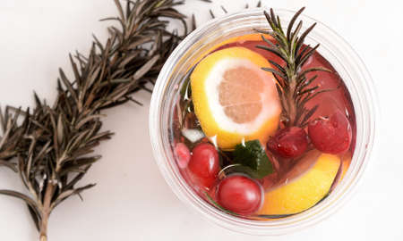 hot raspberries tea with lemon and vitaminsの写真素材