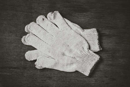 Working gloves on a wooden table